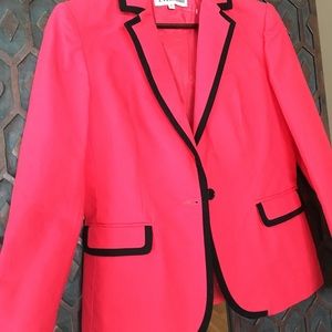 Blazer. Beautiful strawberry red with black trim.
